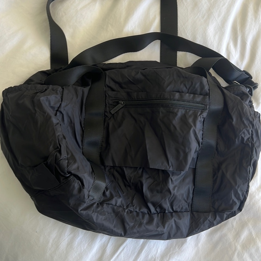 Unused Calpak duffel bag black